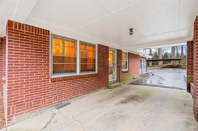 view of patio featuring a carport