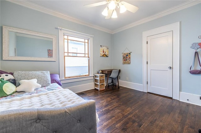 bedroom with dark hardwood / wood-style flooring, ornamental molding, and ceiling fan