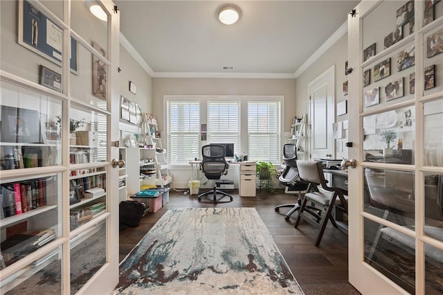 office with crown molding, dark wood-style flooring, and visible vents