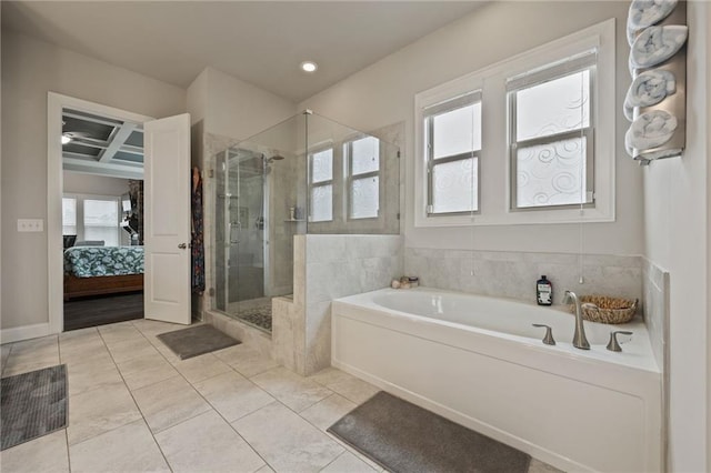 ensuite bathroom featuring connected bathroom, tile patterned flooring, recessed lighting, a garden tub, and a stall shower