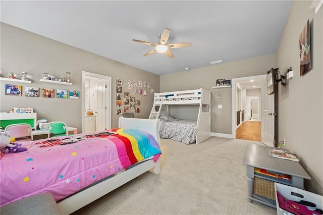 bedroom with baseboards, ceiling fan, carpet flooring, and visible vents