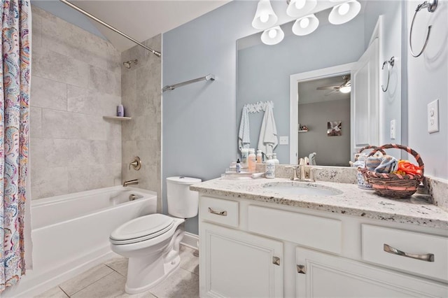 full bath featuring tile patterned flooring, vanity, toilet, ceiling fan, and shower / tub combo