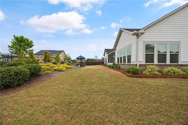 view of yard with fence