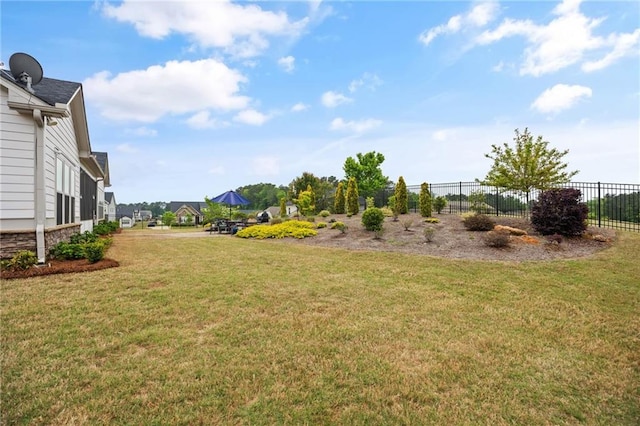 view of yard with fence
