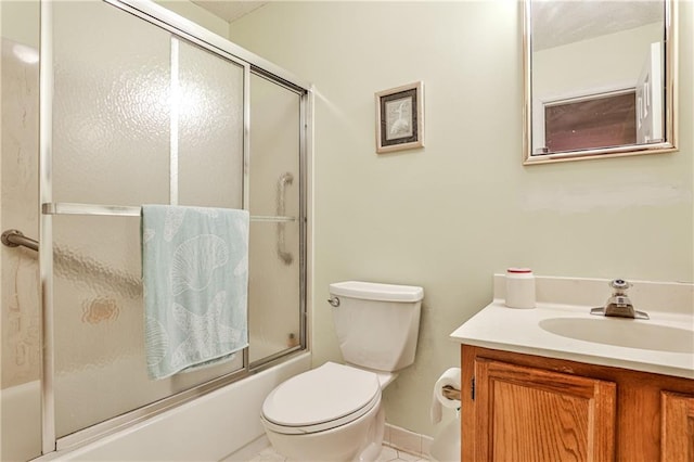 1750 Clairmont Rd Unit 35, Decatur, GA 30033 - full bath featuring vanity, combined bath / shower with glass door, toilet, and tile patterned flooring