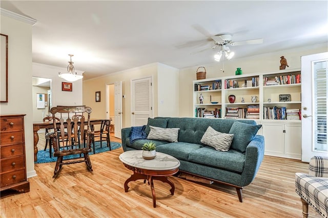 1750 Clairmont Rd Unit 35, Decatur, GA 30033 - living area featuring crown molding, light wood-style flooring, and ceiling fan