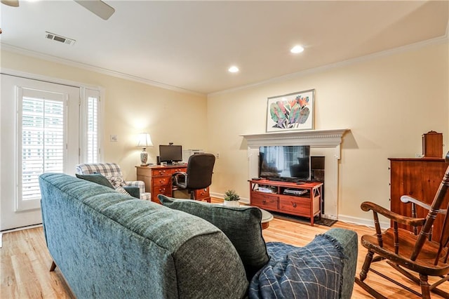 1750 Clairmont Rd Unit 35, Decatur, GA 30033 - living area featuring light wood-style flooring, ornamental molding, a ceiling fan, recessed lighting, and baseboards