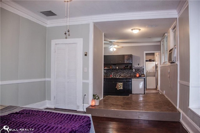 kitchen with tasteful backsplash, dark wood-type flooring, stainless steel dishwasher, and ornamental molding