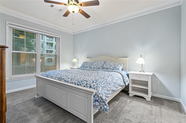 bedroom with carpet, ornamental molding, baseboards, and ceiling fan