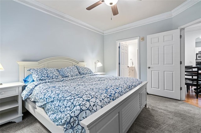 bedroom featuring crown molding, carpet floors, ceiling fan, and connected bathroom