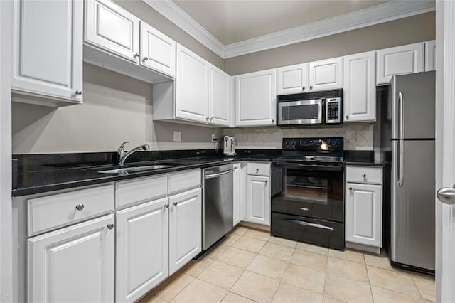 kitchen with stainless steel appliances, a sink, crown molding, white cabinetry, and light tile patterned flooring