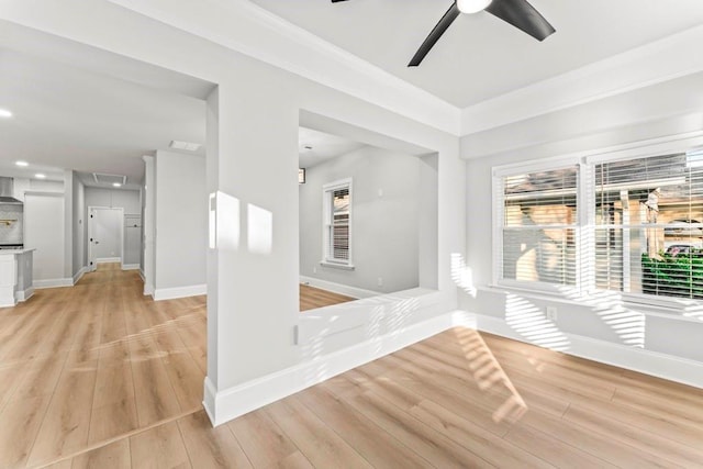 2128 Hosea L Williams Dr NE, Atlanta, GA 30317 - empty room featuring a ceiling fan, healthy amount of natural light, and light wood-style flooring