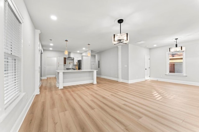 2128 Hosea L Williams Dr NE, Atlanta, GA 30317 - unfurnished living room with recessed lighting and light wood finished floors