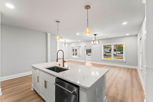 2128 Hosea L Williams Dr NE, Atlanta, GA 30317 - kitchen featuring stainless steel dishwasher, light wood-style flooring, hanging light fixtures, open floor plan, and recessed lighting