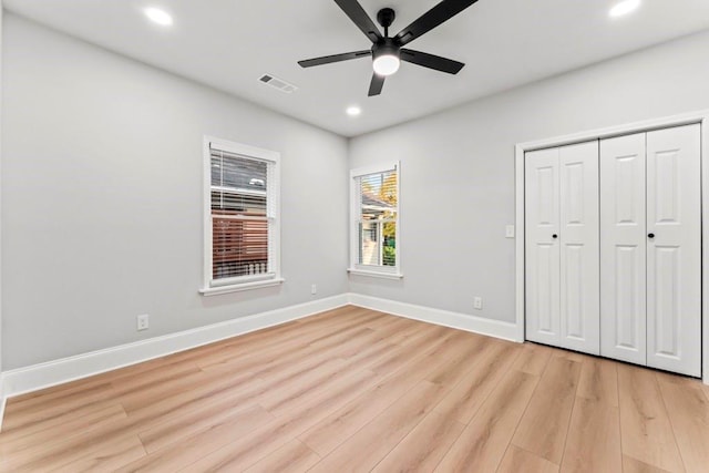 2128 Hosea L Williams Dr NE, Atlanta, GA 30317 - unfurnished bedroom featuring recessed lighting, light wood-style flooring, a closet, and ceiling fan