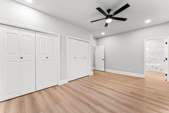 2128 Hosea L Williams Dr NE, Atlanta, GA 30317 - unfurnished bedroom with two closets, light wood-type flooring, recessed lighting, connected bathroom, and ceiling fan