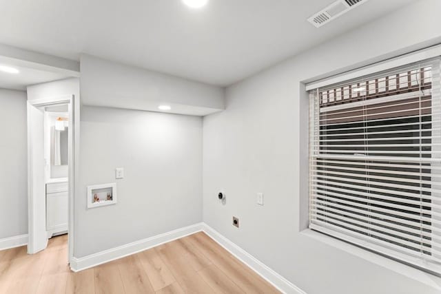 2128 Hosea L Williams Dr NE, Atlanta, GA 30317 - laundry area featuring hookup for a washing machine, hookup for an electric dryer, light wood-type flooring, and recessed lighting