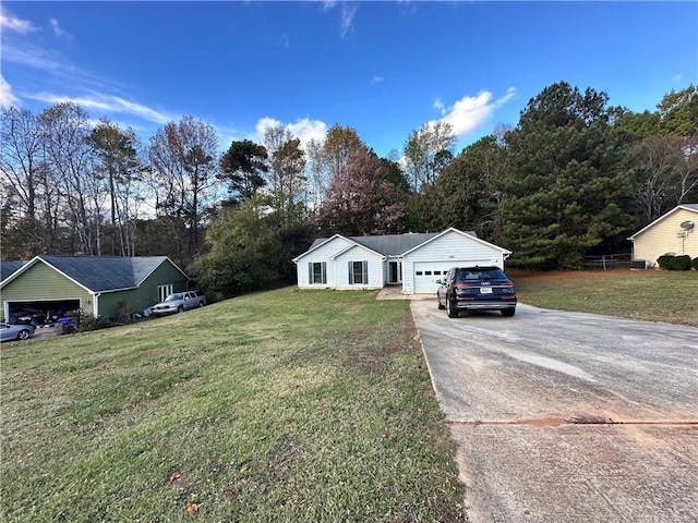 view of front facade featuring a garage and a front yard