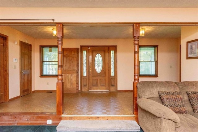 entryway featuring a textured ceiling