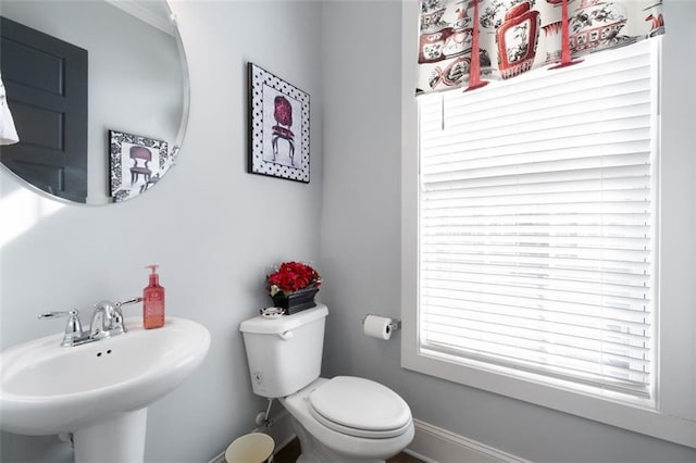 bathroom with sink and toilet