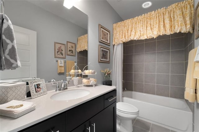 full bathroom featuring toilet, tile patterned floors, shower / bathtub combination with curtain, and vanity