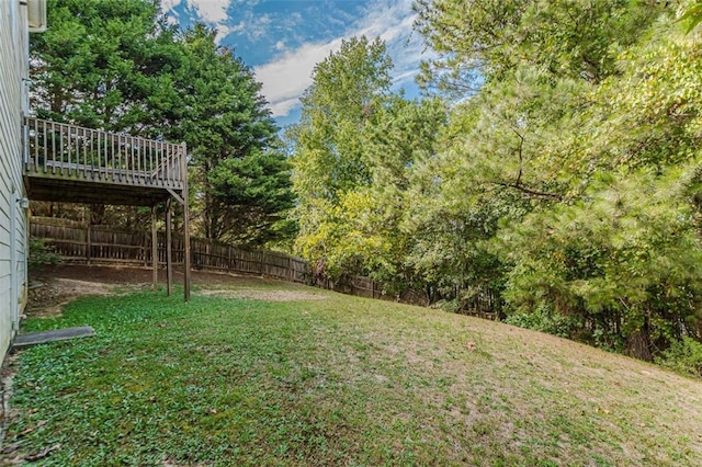 view of yard with a deck