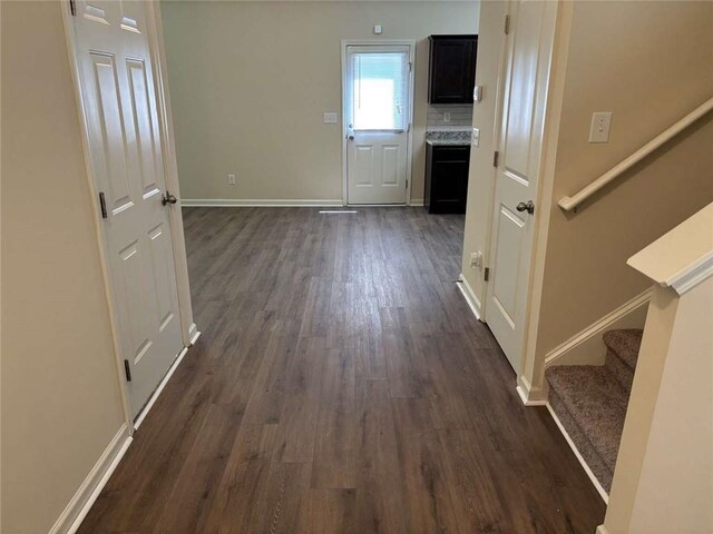 interior space with dark hardwood / wood-style flooring