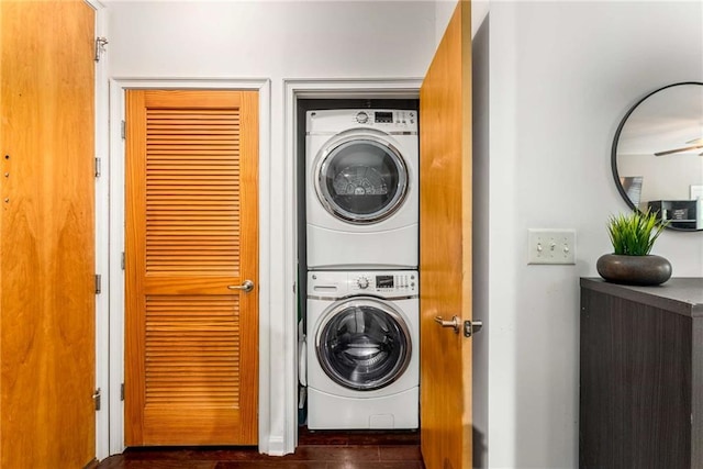 898 Oak St SW Unit 1301, Atlanta, GA 30310 - washroom featuring estacked washer and dryer and dark wood-style floors