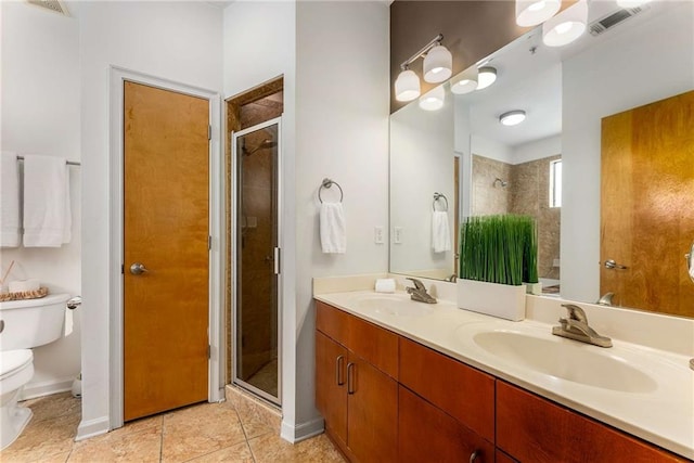898 Oak St SW Unit 1301, Atlanta, GA 30310 - bathroom with a stall shower, double vanity, and tile patterned floors
