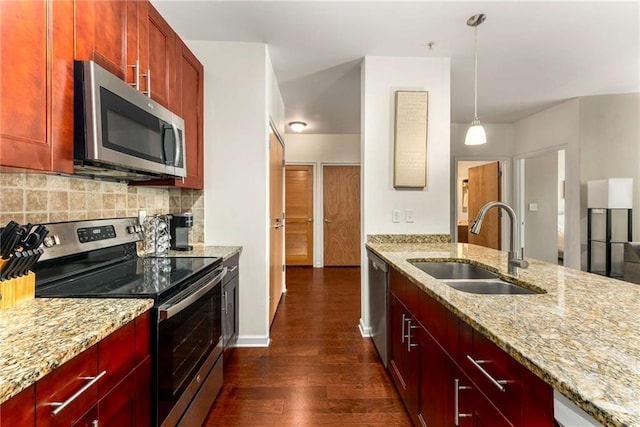 898 Oak St SW Unit 1301, Atlanta, GA 30310 - kitchen featuring stainless steel appliances, dark brown cabinets, dark wood-type flooring, light stone counters, and tasteful backsplash