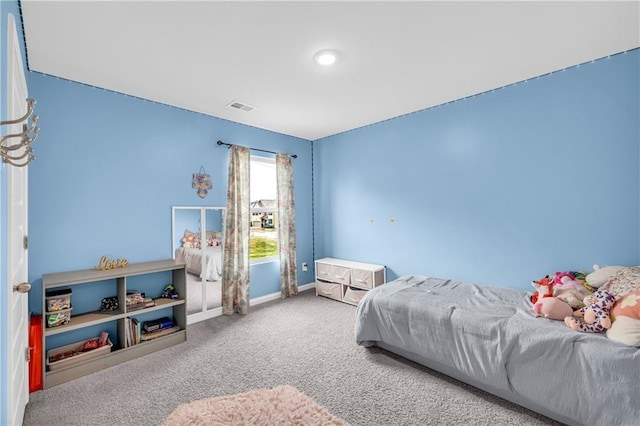 509 Azalea Bloom Dr, Loganville, GA 30052 - carpeted bedroom with baseboards and visible vents