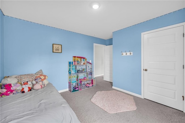 509 Azalea Bloom Dr, Loganville, GA 30052 - carpeted bedroom with baseboards