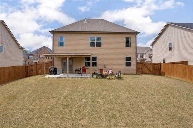509 Azalea Bloom Dr, Loganville, GA 30052 - rear view of house with a lawn, a fenced backyard, and a patio area
