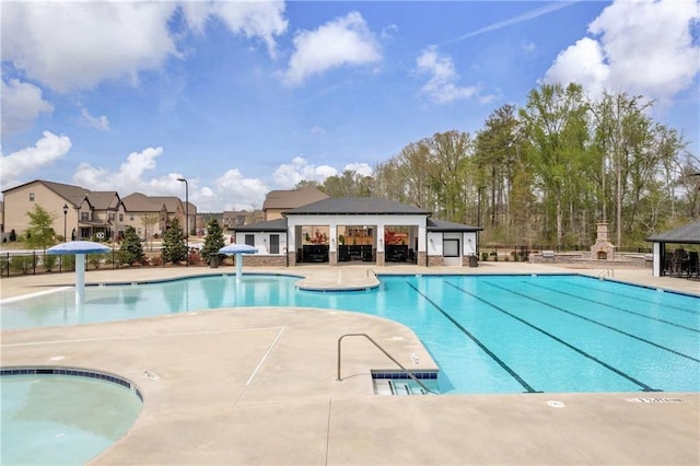 509 Azalea Bloom Dr, Loganville, GA 30052 - community pool featuring fence and a patio area