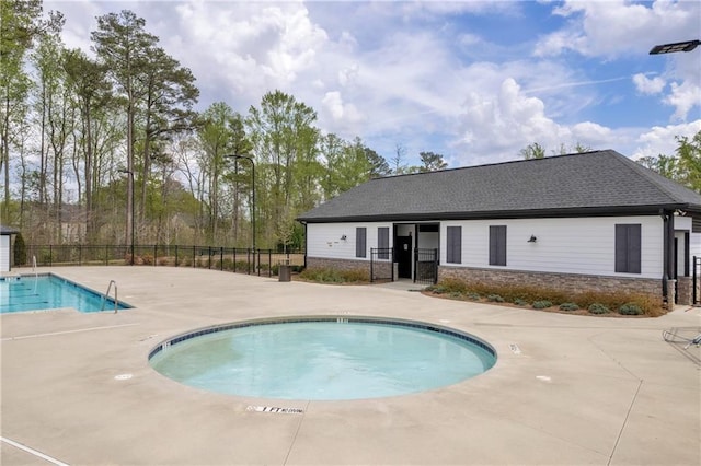 509 Azalea Bloom Dr, Loganville, GA 30052 - community pool featuring a patio and fence