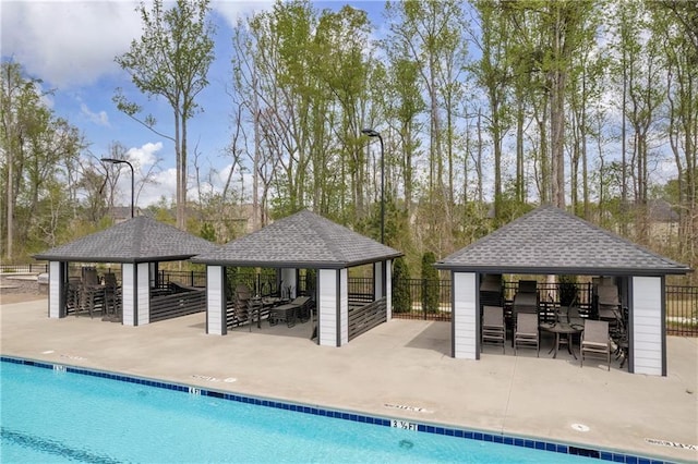 509 Azalea Bloom Dr, Loganville, GA 30052 - pool with fence, outdoor dry bar, a gazebo, and a patio area