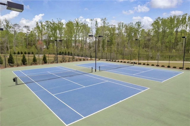509 Azalea Bloom Dr, Loganville, GA 30052 - view of tennis court featuring fence and community basketball court