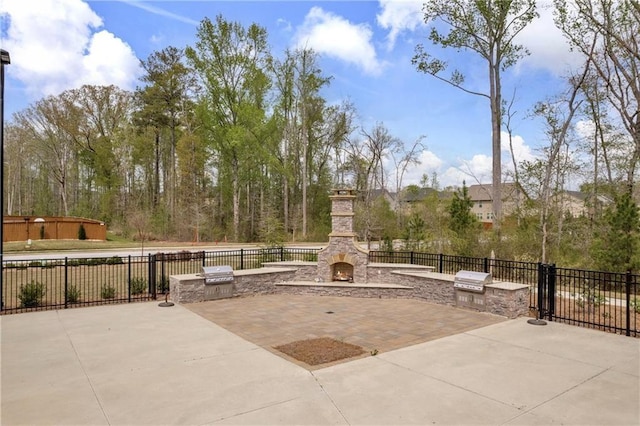 509 Azalea Bloom Dr, Loganville, GA 30052 - view of home's community with area for grilling, a patio, and fence