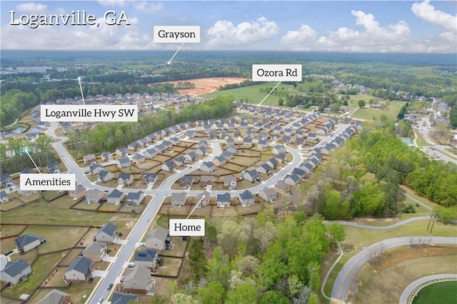 509 Azalea Bloom Dr, Loganville, GA 30052 - aerial view featuring a wooded view and a residential view