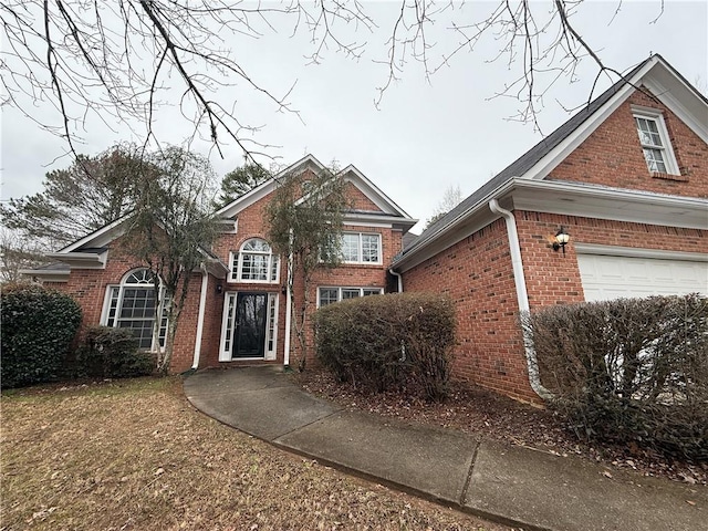 traditional home with brick siding