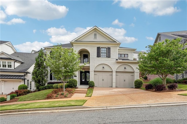 4025 Connolly Ct, Roswell, GA 30075 - view of front facade with brick siding, concrete driveway, a garage, a balcony, and french doors