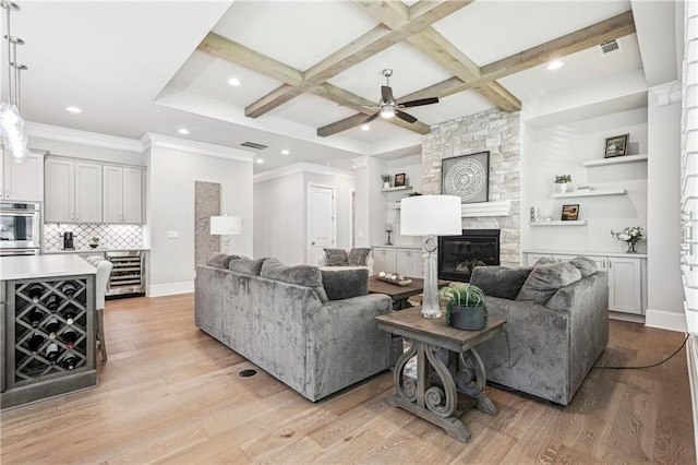 4025 Connolly Ct, Roswell, GA 30075 - living area with beverage cooler, recessed lighting, ceiling fan, coffered ceiling, and a fireplace