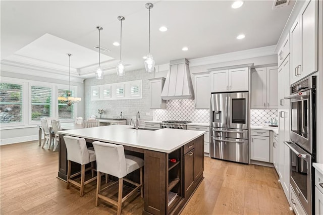 4025 Connolly Ct, Roswell, GA 30075 - kitchen featuring stainless steel appliances, custom exhaust hood, light countertops, backsplash, and recessed lighting