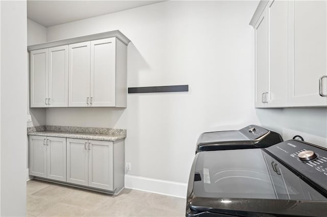 4025 Connolly Ct, Roswell, GA 30075 - washroom featuring cabinet space, washing machine and dryer, and baseboards
