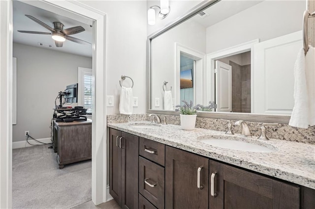 4025 Connolly Ct, Roswell, GA 30075 - full bath with double vanity, a ceiling fan, and baseboards