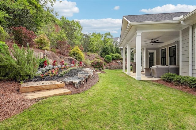 4025 Connolly Ct, Roswell, GA 30075 - view of grassy yard featuring ceiling fan, an outdoor living space, and a patio area