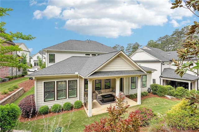 4025 Connolly Ct, Roswell, GA 30075 - back of house featuring a patio, a yard, an outdoor hangout area, and a residential view