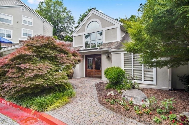 4244 River Green Dr NW Unit 111, Atlanta, GA 30327 - property entrance featuring stucco siding and french doors
