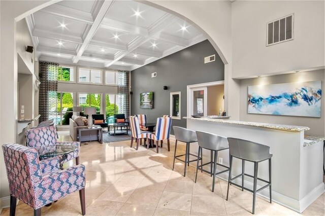 4244 River Green Dr NW Unit 111, Atlanta, GA 30327 - interior space with a high ceiling, beamed ceiling, coffered ceiling, and visible vents