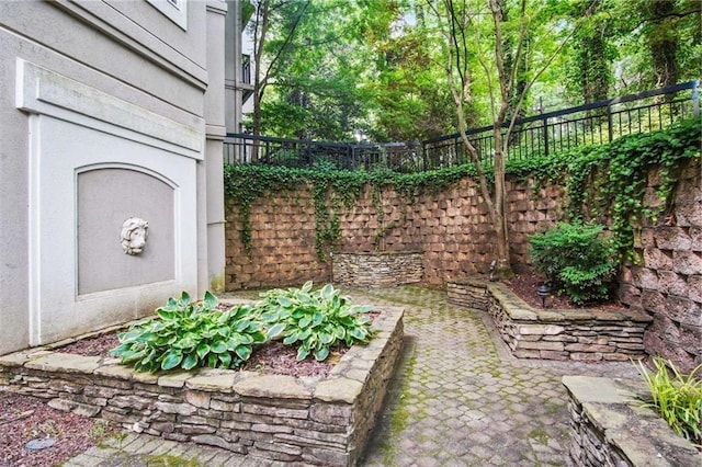 4244 River Green Dr NW Unit 111, Atlanta, GA 30327 - view of yard with a fenced backyard and a patio area